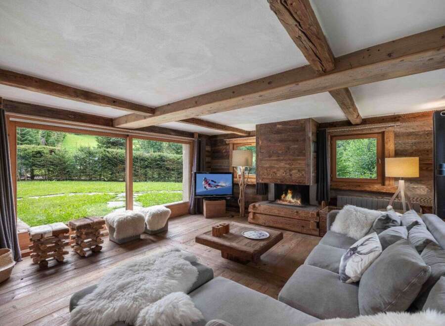 Experience the epitome of rustic luxury in this stunning living room.