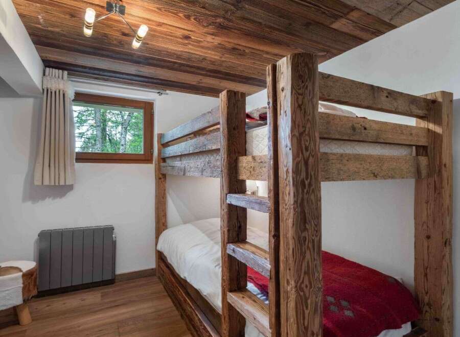 Rustic charm meets modern comfort in this cozy bedroom.