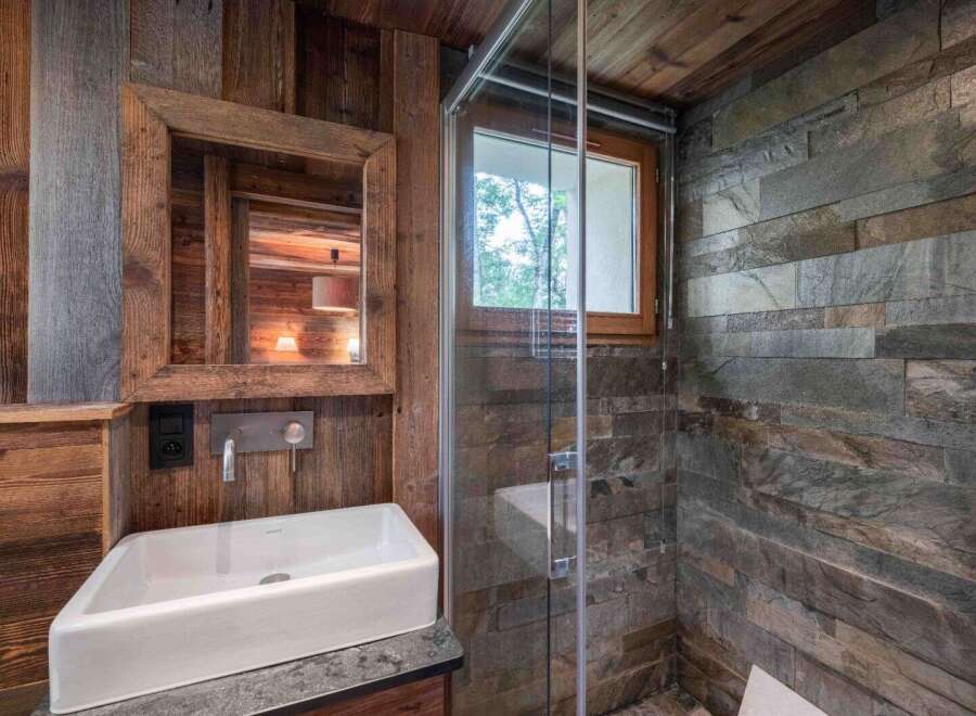 Experience rustic elegance in this stunning bathroom.