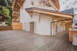This stunning property boasts a beautiful wooden deck, perfect for enjoying the outdoors.