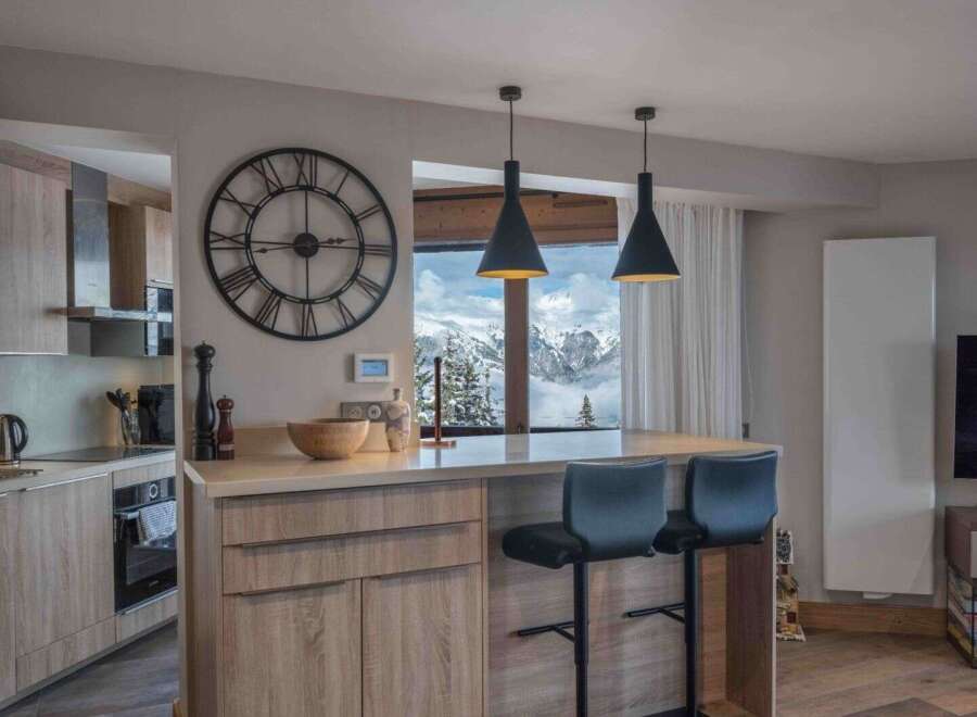 This stunning kitchen boasts a modern design with a touch of rustic charm.