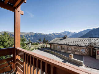 Experience breathtaking mountain views from this charming property, perfect for a ski resort getaway.