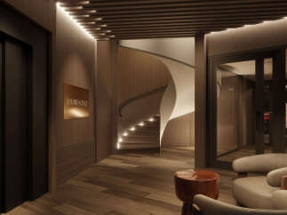 Step into luxury with this stunning property, featuring a grand entrance with a modern spiral staircase.