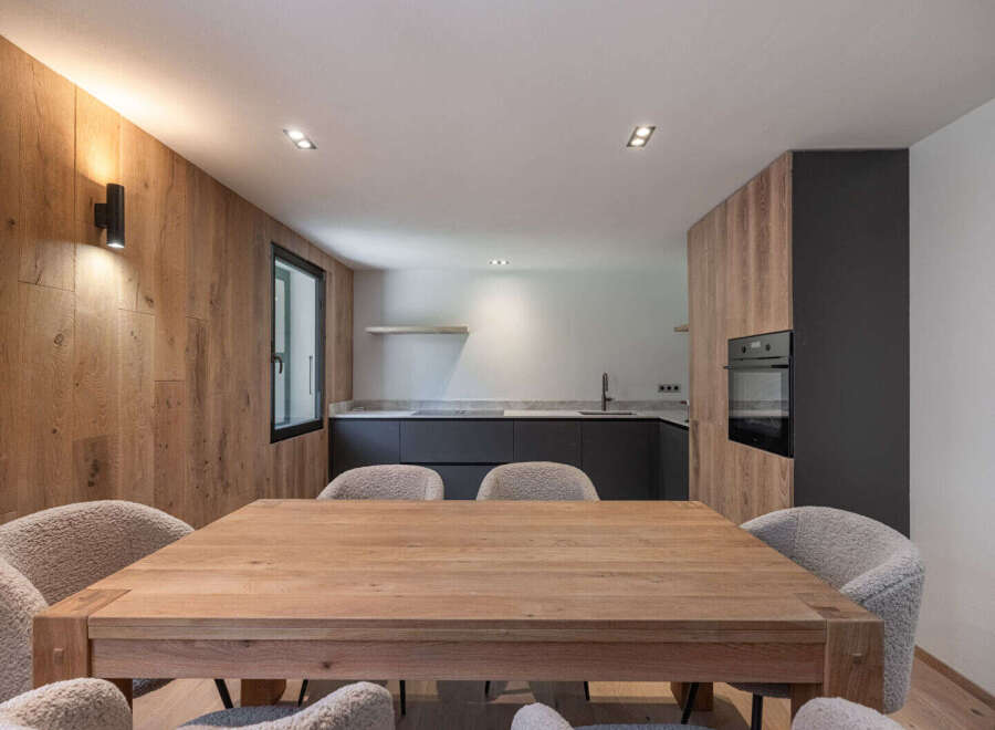 This stunning property boasts a modern kitchen and dining area, perfect for entertaining.
