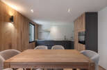 This stunning property boasts a modern kitchen and dining area, perfect for entertaining.