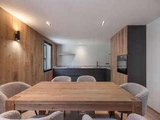 This stunning property boasts a modern kitchen and dining area, perfect for entertaining.