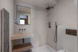 This modern bathroom features a sleek design with a minimalist aesthetic.