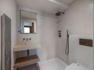 This modern bathroom features a sleek design with a minimalist aesthetic.