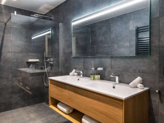 Step into luxury with this modern bathroom design.