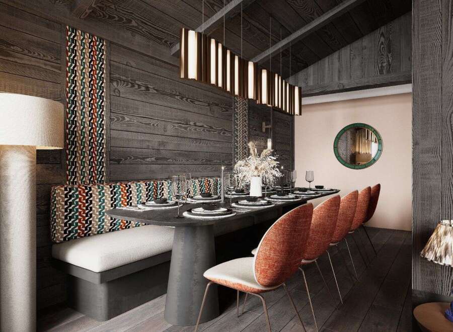 Experience luxury dining in this exquisite property! The dining area features a stylish table setting, complemented by designer chairs and elegant lighting.