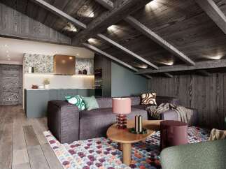 Experience the charm of this stunning property, featuring a cozy living space with a unique wooden ceiling and exposed beams.