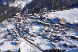 Discover the charm of this stunning mountain village nestled in a winter wonderland.