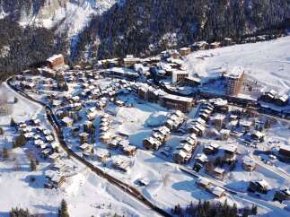 Discover the charm of this stunning mountain village nestled in a winter wonderland.