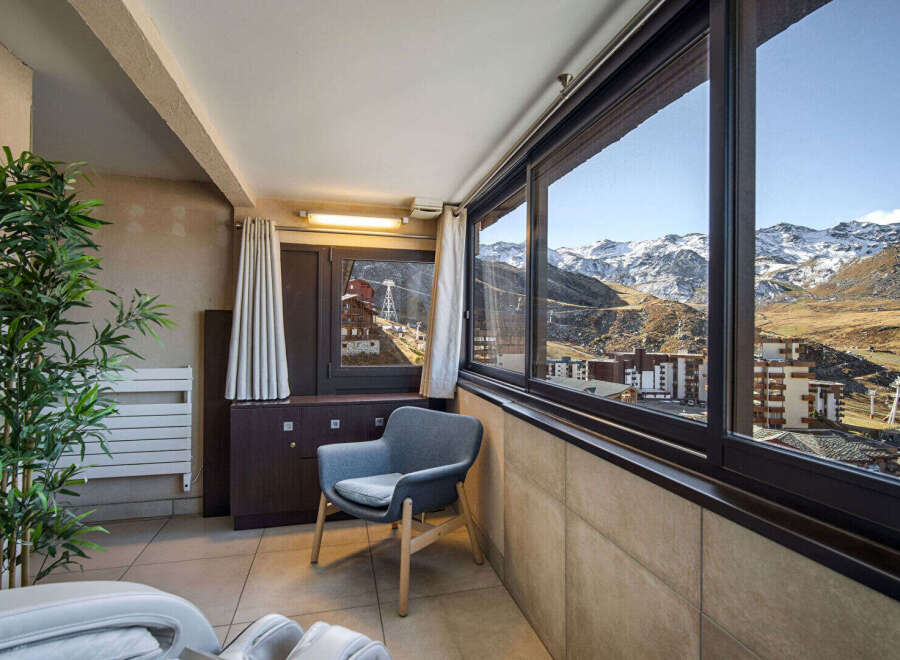 Enjoy breathtaking mountain views from this cozy apartment.