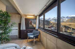 Enjoy breathtaking mountain views from this cozy apartment.
