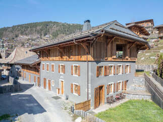 Discover the charm of this stunning property, boasting a unique blend of rustic architecture and modern comfort.