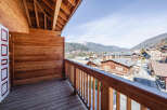 Enjoy breathtaking mountain views from this charming balcony.