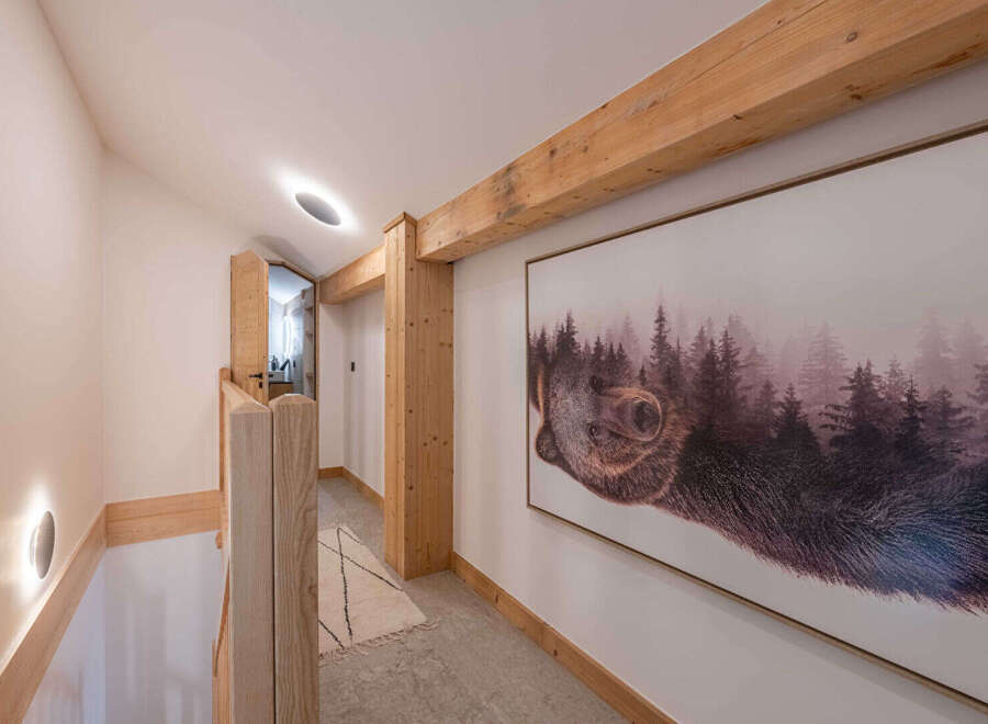 This stunning hallway showcases a blend of rustic charm and modern design.