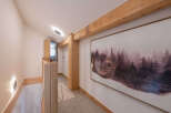 This stunning hallway showcases a blend of rustic charm and modern design.