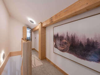 This stunning hallway showcases a blend of rustic charm and modern design.