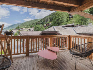 Enjoy breathtaking mountain views from this stunning balcony.