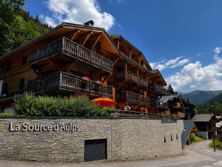 Experience the charm of alpine living in this stunning wooden chalet, 'La Source d'Aulps.