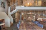 This stunning property boasts a rustic yet modern design, perfect for those seeking a luxurious mountain retreat.