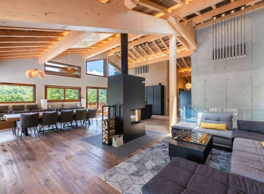Experience luxury living in this stunning property featuring a modern fireplace, perfect for cozy evenings.