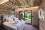 Experience luxury and comfort in this stunning bedroom.
