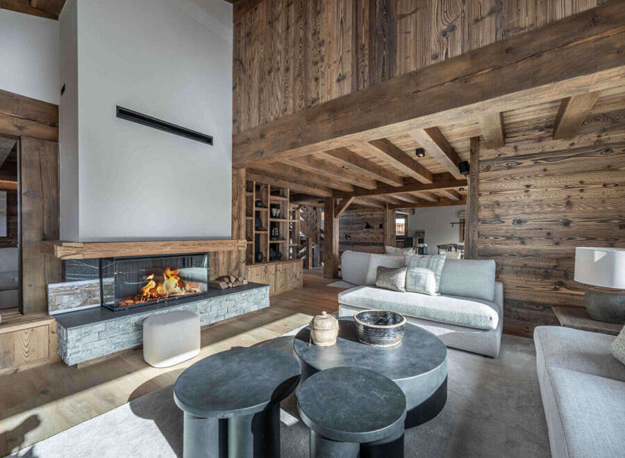 Experience luxury living in this stunning property featuring a cozy fireplace, perfect for those chilly evenings.