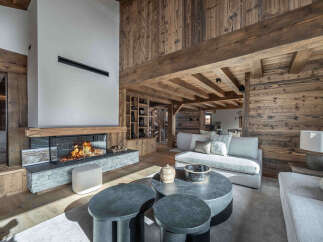 Experience luxury living in this stunning property featuring a cozy fireplace, perfect for those chilly evenings.