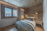 Experience the epitome of rustic elegance in this stunning bedroom.