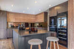 This stunning kitchen boasts a modern design with high-end finishes.