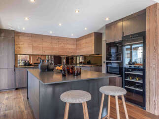 This stunning kitchen boasts a modern design with high-end finishes.