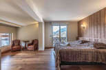Experience the epitome of comfort in this luxurious bedroom.