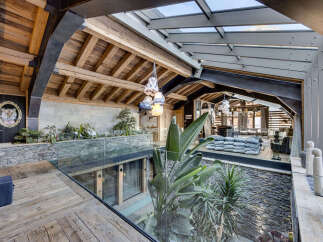 Experience luxury living in this stunning property featuring a unique architectural design.