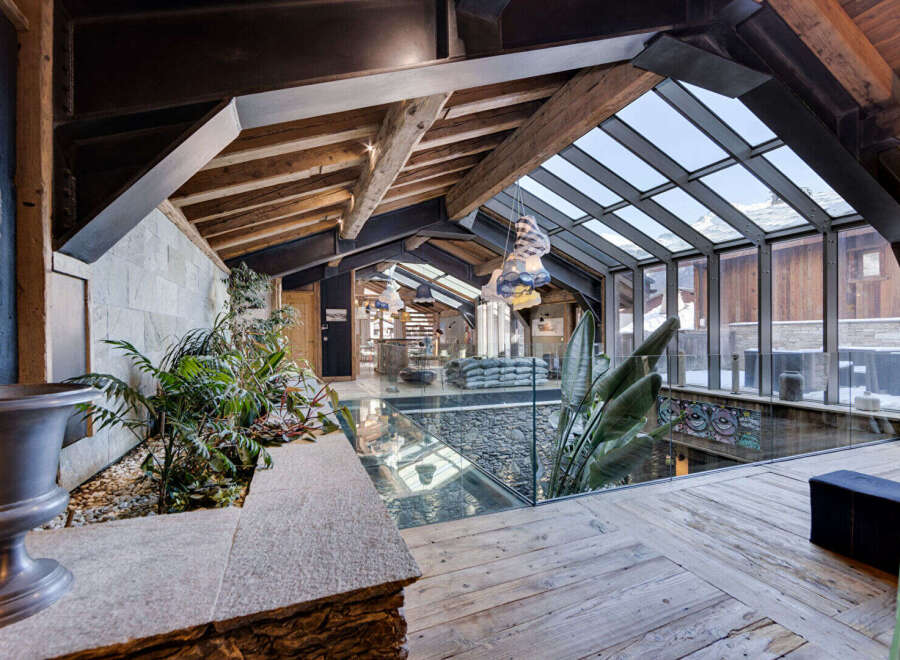 Experience luxury living in this stunning property, showcasing a unique architectural design.