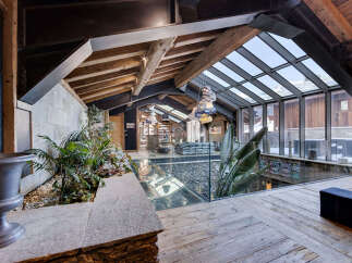 Experience luxury living in this stunning property, showcasing a unique architectural design.