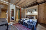 Experience rustic elegance in this stunning bedroom.