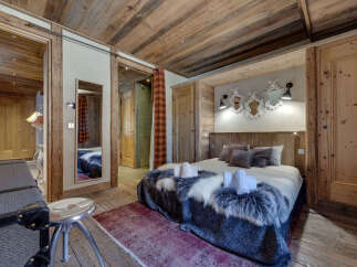 Experience rustic elegance in this stunning bedroom.