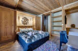 Experience rustic elegance in this stunning bedroom.
