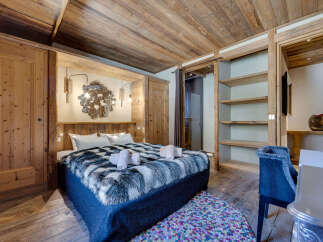 Experience rustic elegance in this stunning bedroom.