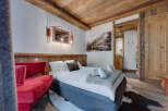 Experience rustic elegance in this stunning bedroom.