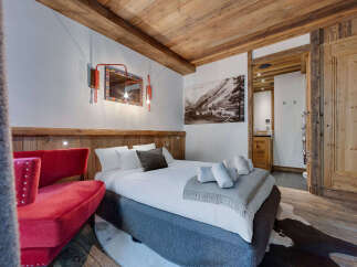Experience rustic elegance in this stunning bedroom.