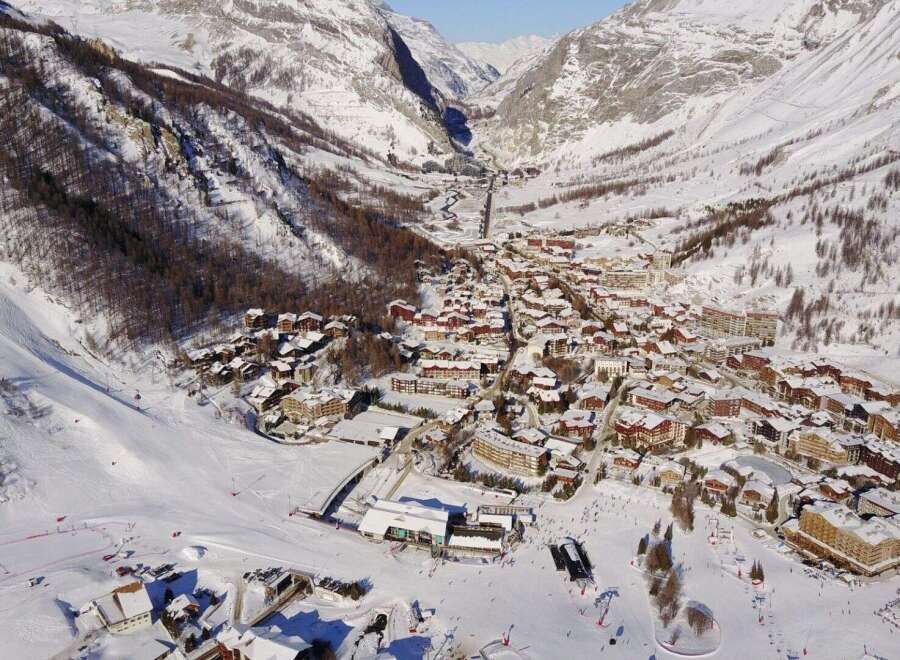 Discover the charm of this stunning mountain village nestled in a snowy valley.