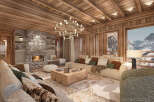 Experience the epitome of luxury living in this stunning chalet, featuring a cozy stone fireplace and a warm, inviting ambiance.