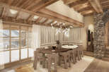 Experience luxury living in this stunning chalet, featuring a spacious dining area perfect for entertaining.