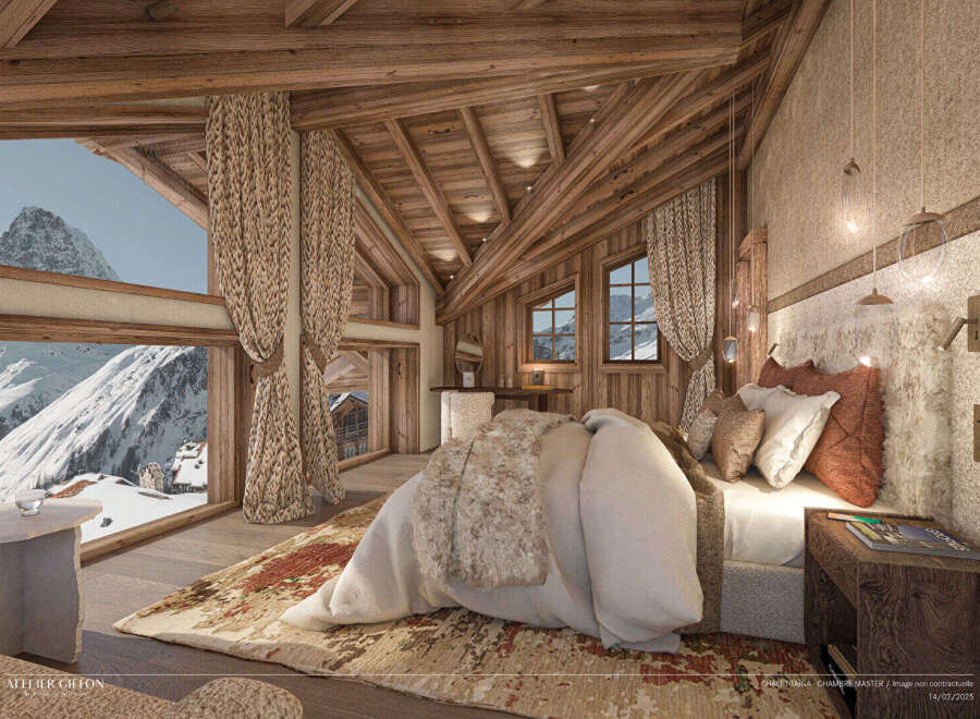 Experience the epitome of luxury in this stunning chalet bedroom, boasting breathtaking mountain views.