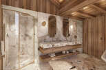 Experience luxury in this stunning bathroom design, featuring exquisite marble accents and warm wooden elements.