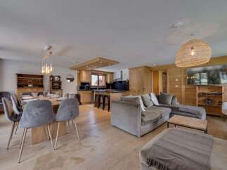 This stunning property boasts a spacious open-plan living area, perfect for entertaining.